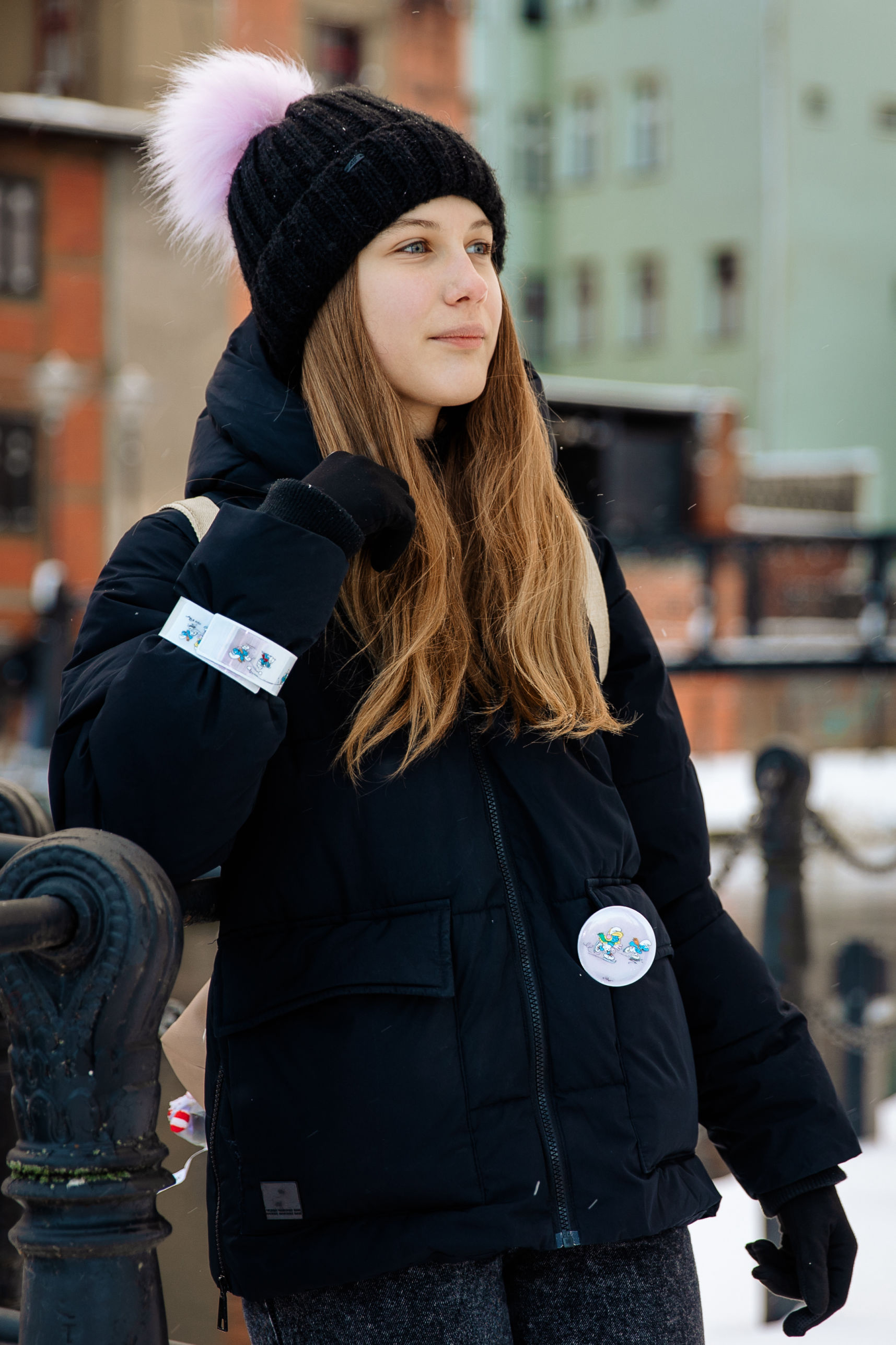 Girl with a reflective button